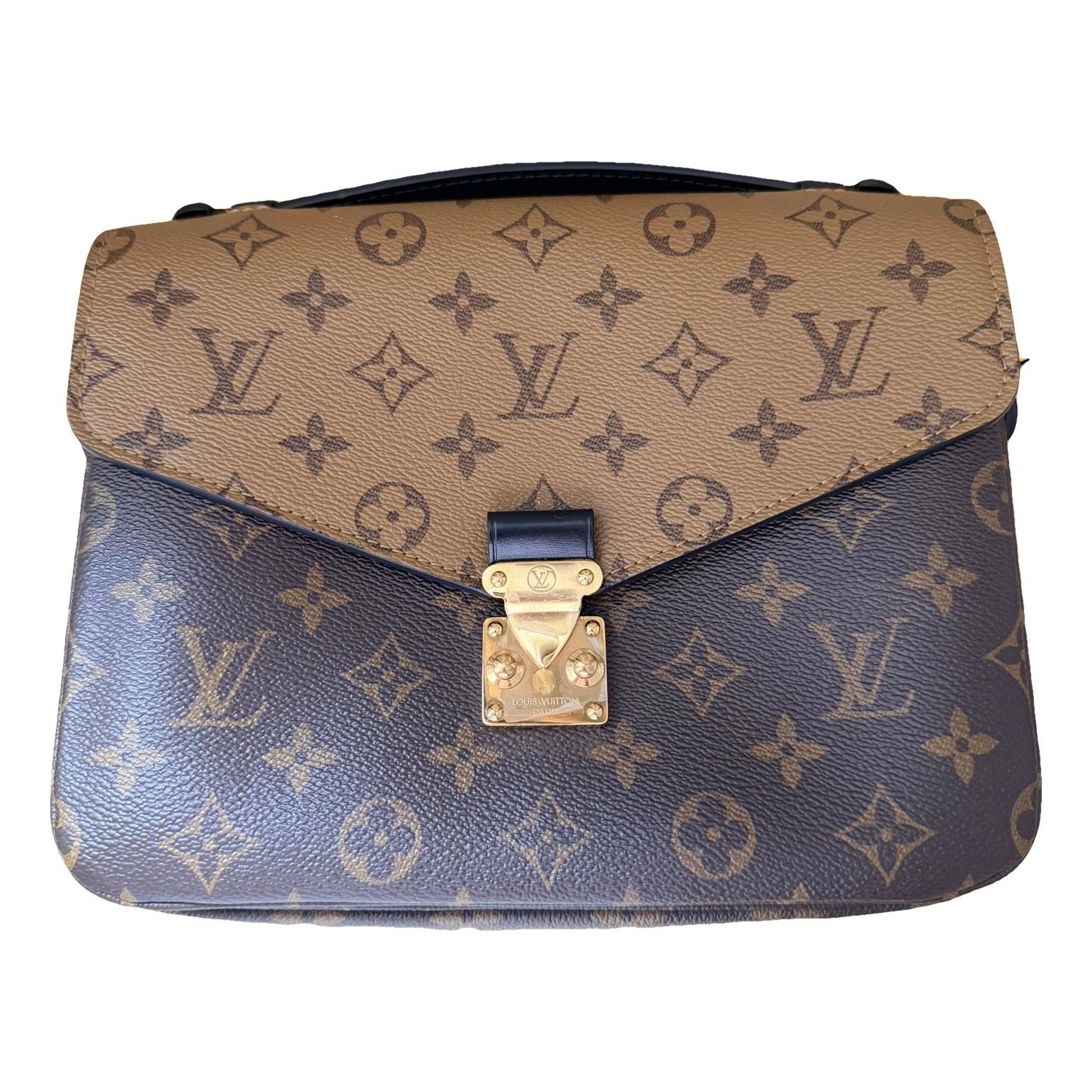 Metis leather crossbody bag