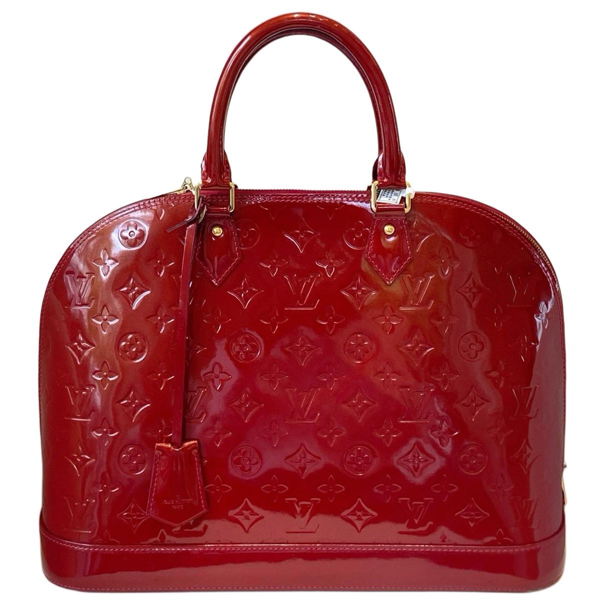 Louis Vuitton Alma patent leather handbag