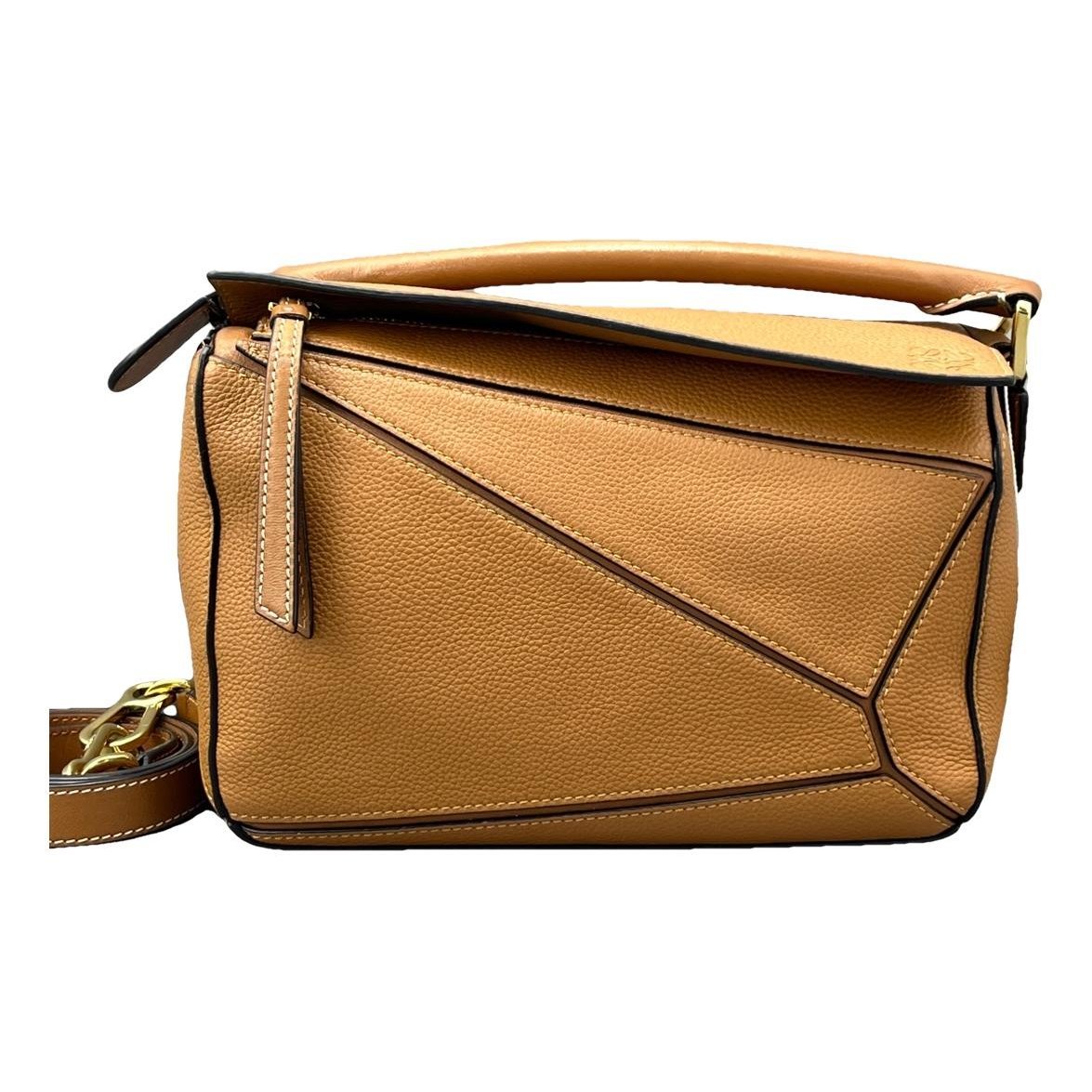 Puzzle leather handbag