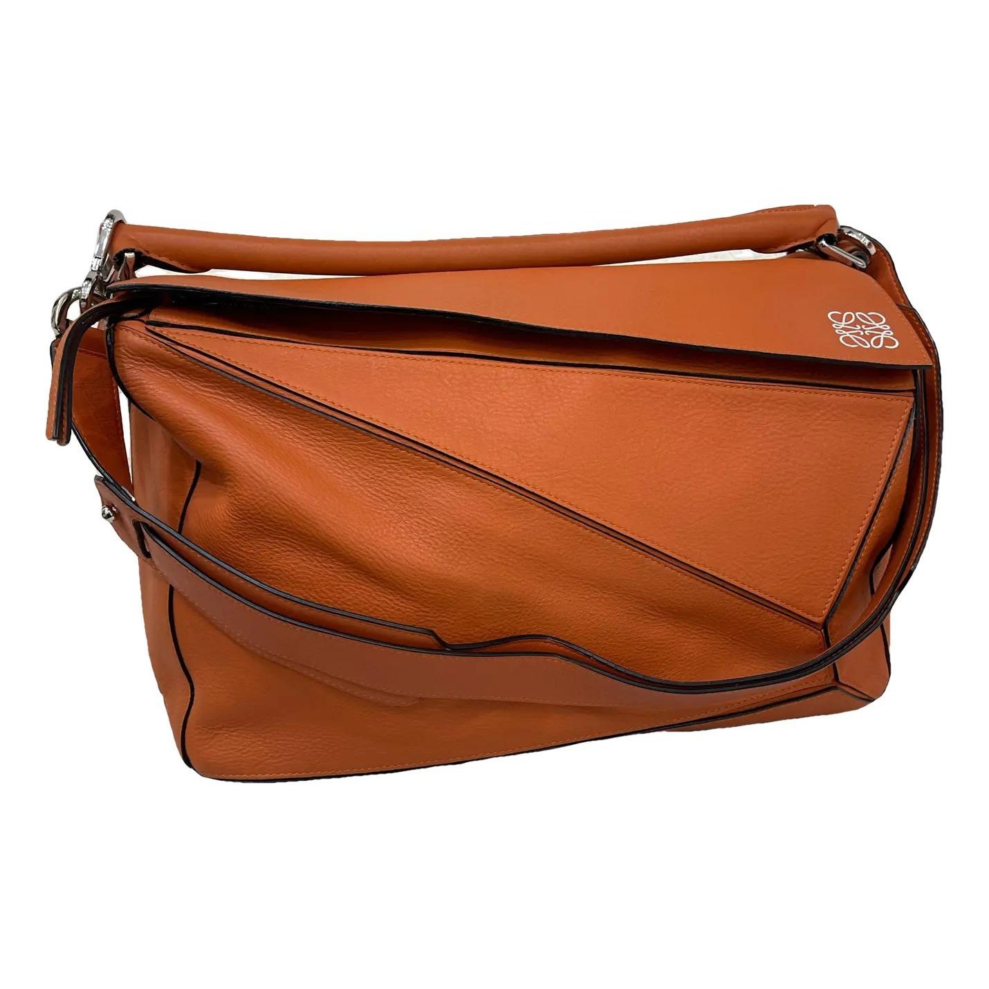 Puzzle leather crossbody bag