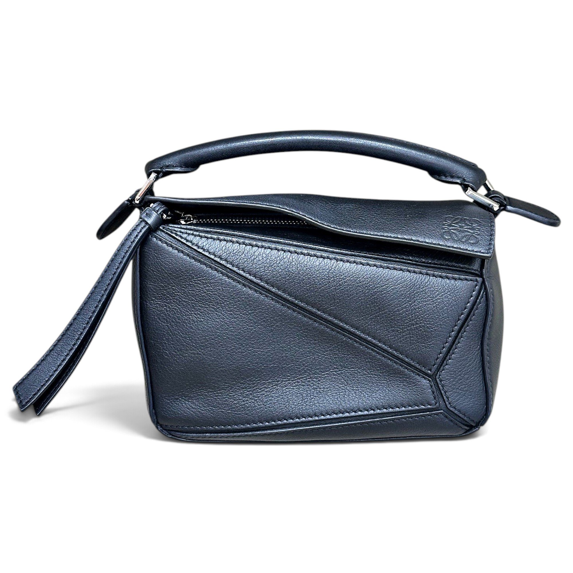 Puzzle leather handbag