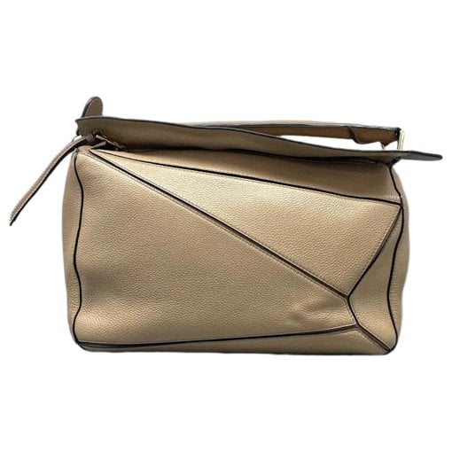 Puzzle leather crossbody bag