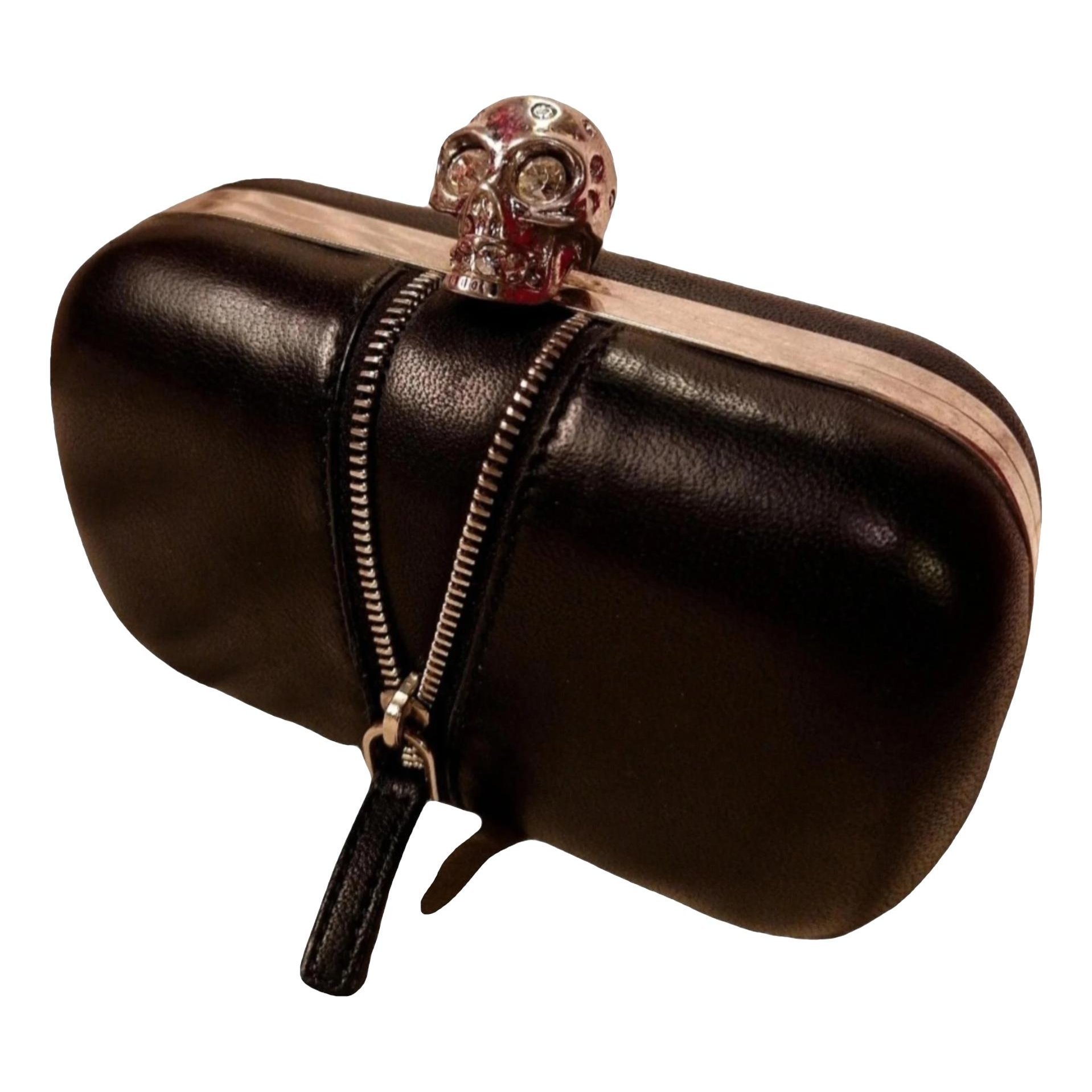 Skull leather clutch bag