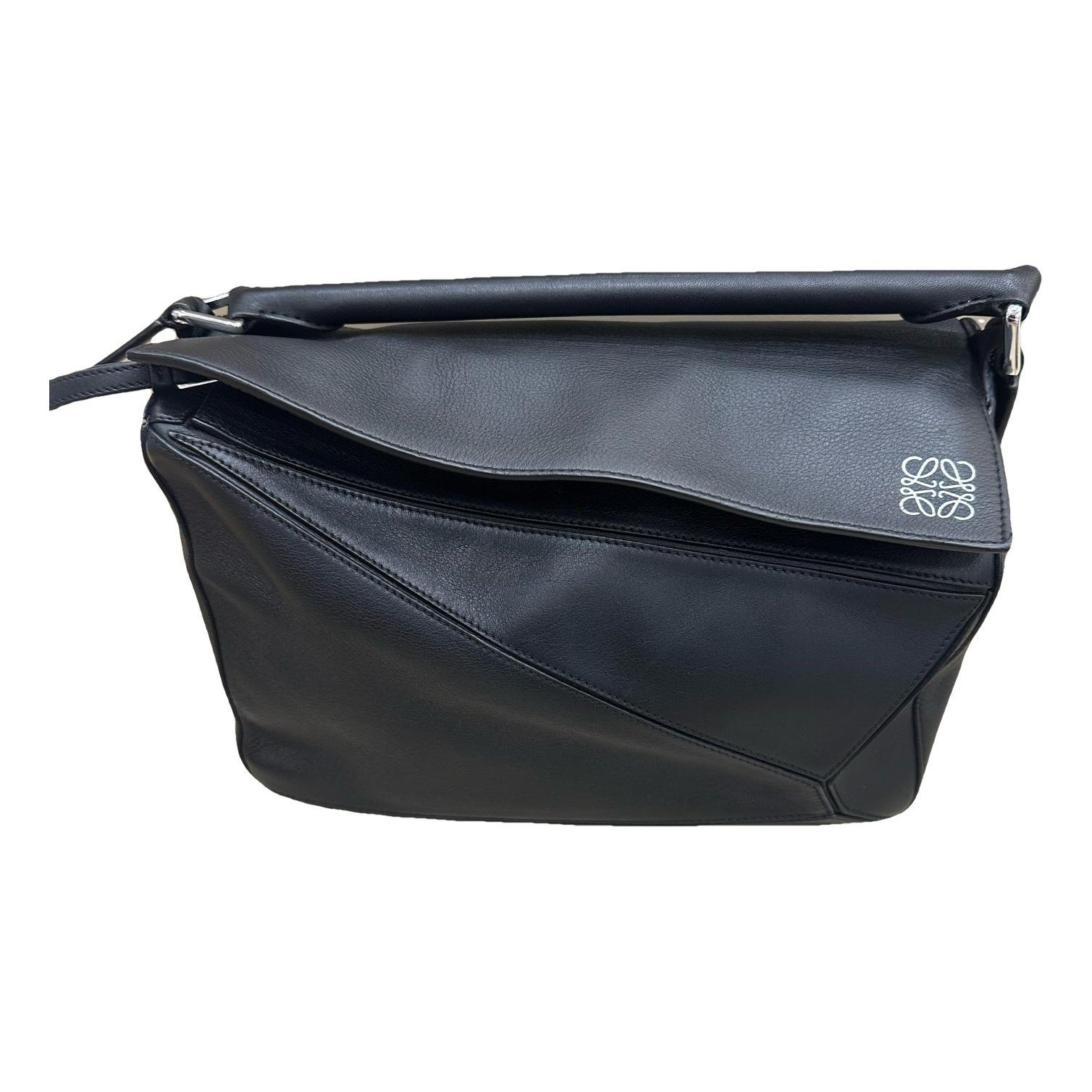 Puzzle leather handbag