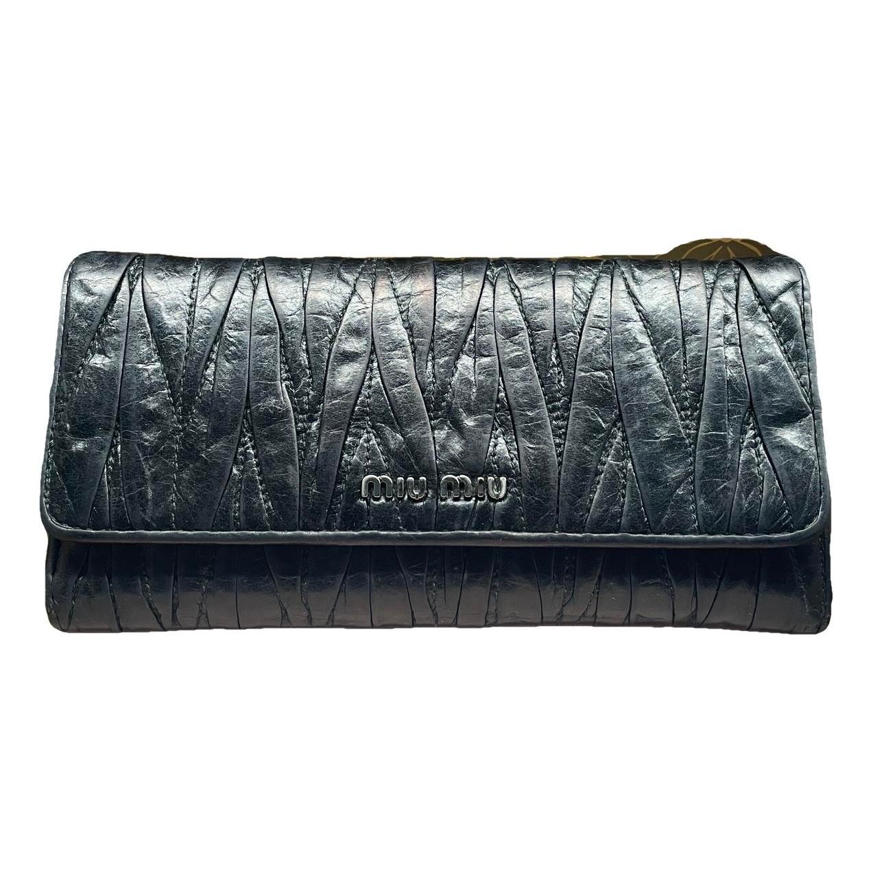 Matelassé leather clutch bag