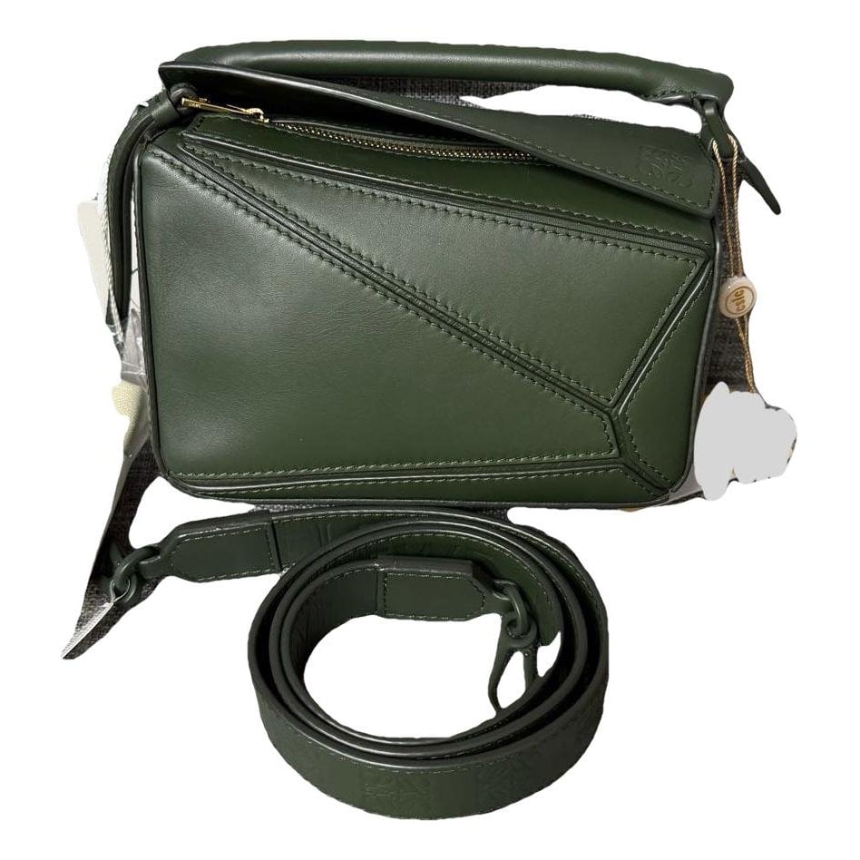 Puzzle leather handbag