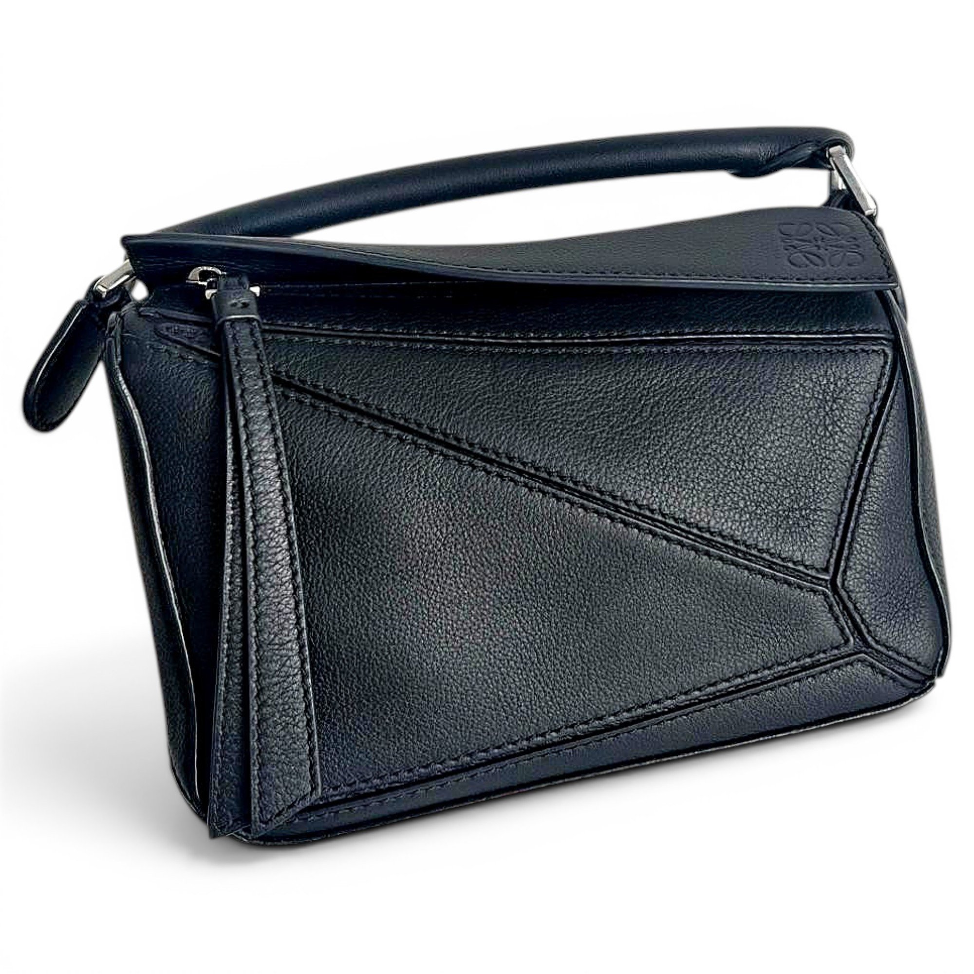 Puzzle leather handbag