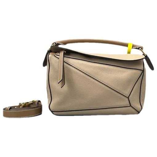 Puzzle leather crossbody bag