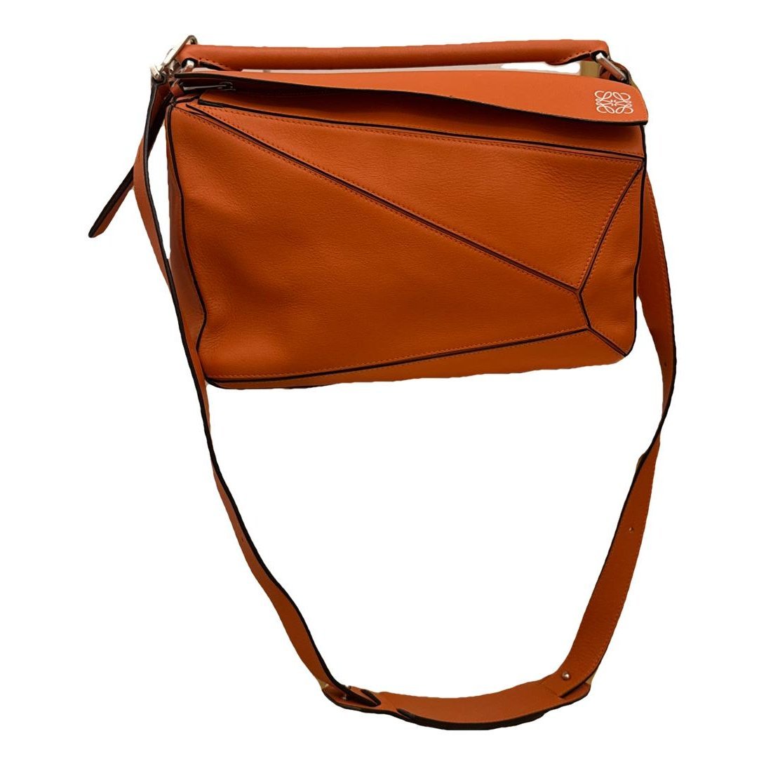 Puzzle leather handbag