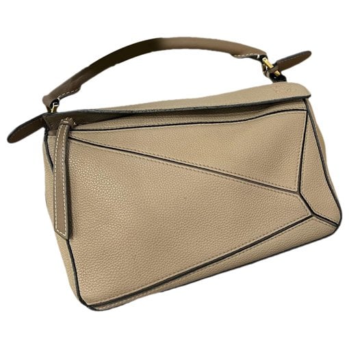 Puzzle leather handbag