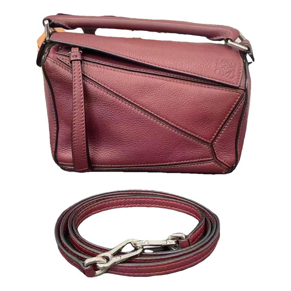 Puzzle leather handbag