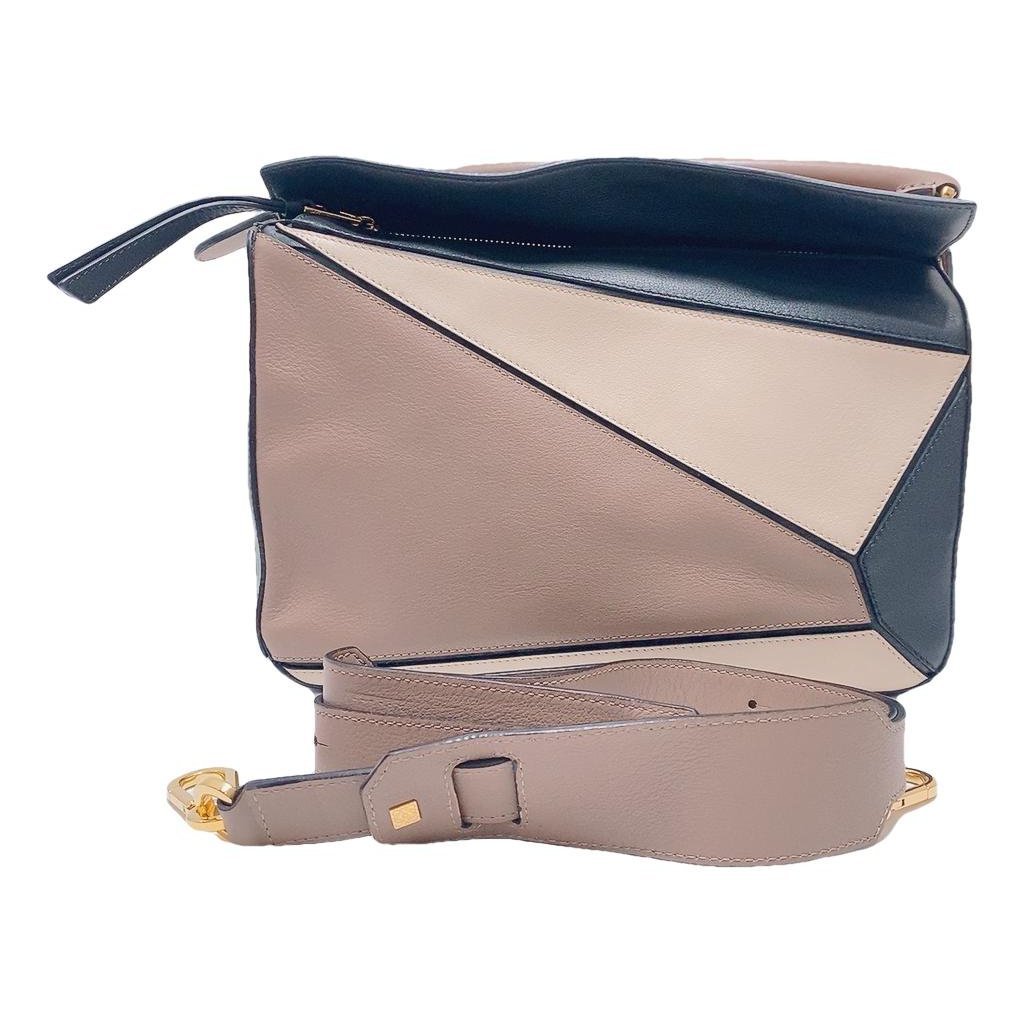 Puzzle leather handbag