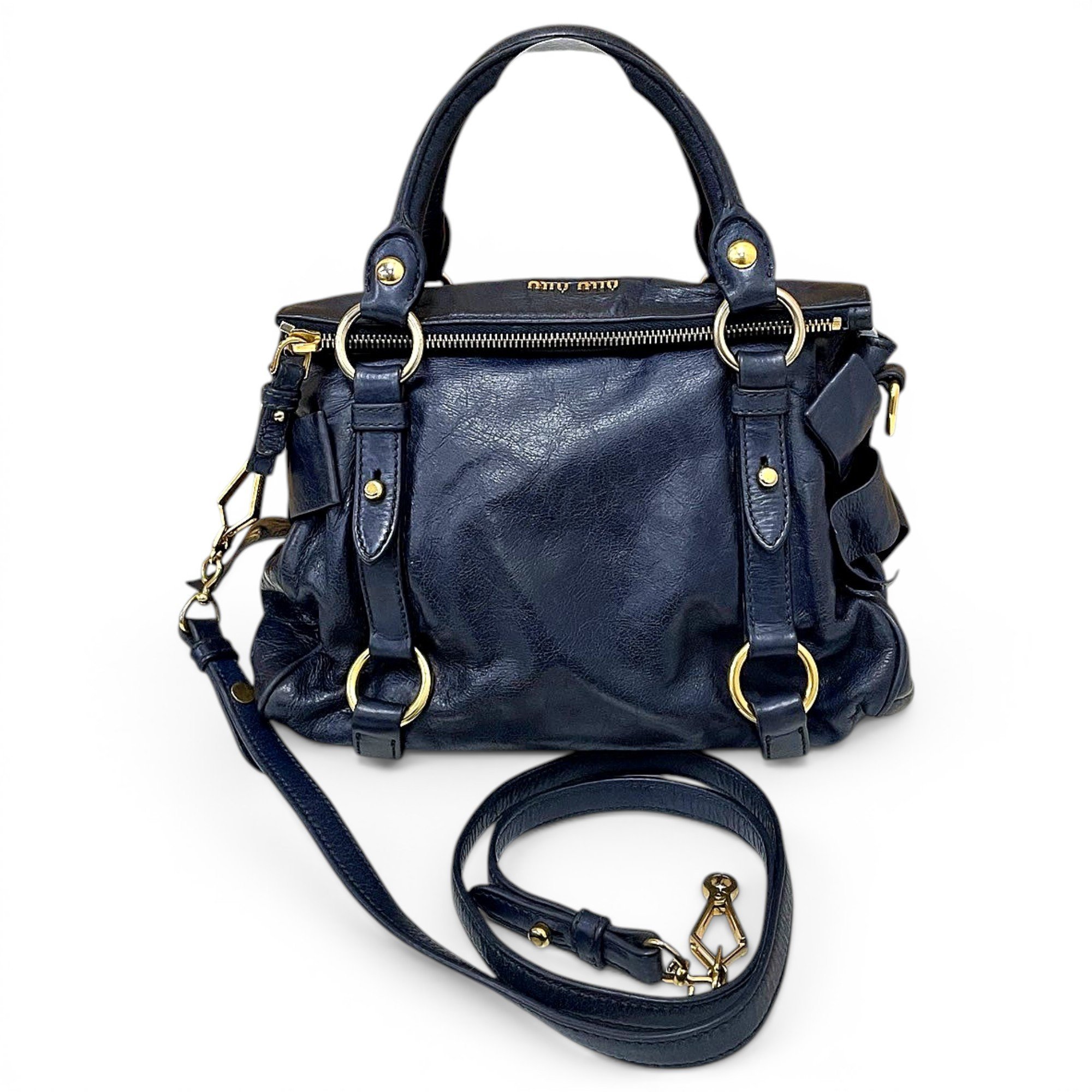 Bow bag leather handbag