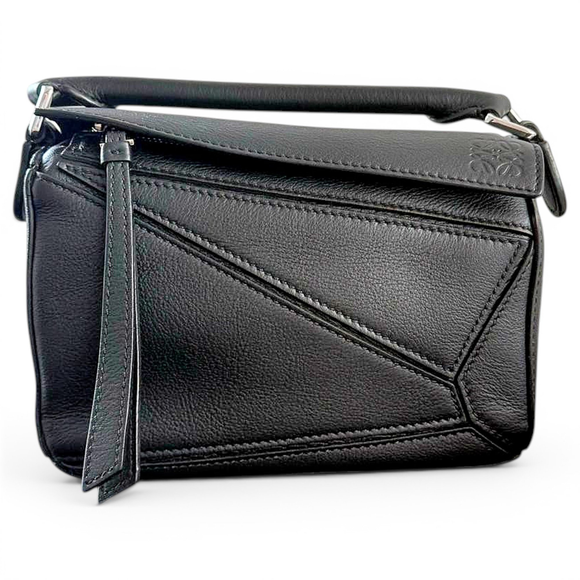 Puzzle leather handbag