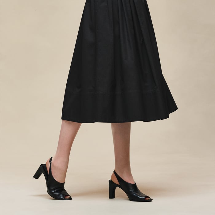 Noir "Mosaique" Pleated Skirt With Basque
