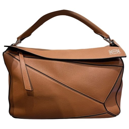 Puzzle leather handbag