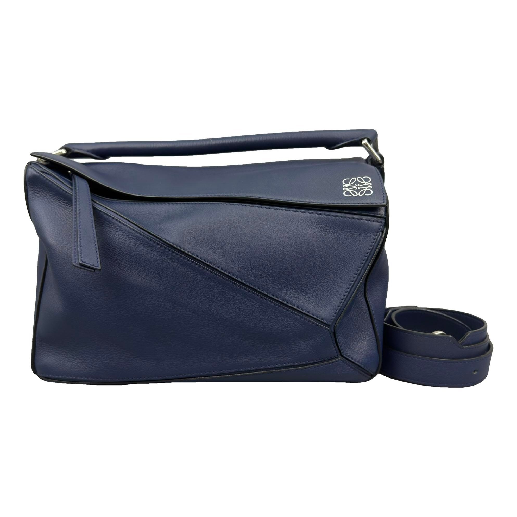 Puzzle leather handbag