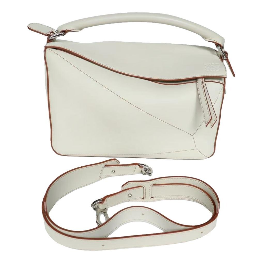 Puzzle leather handbag