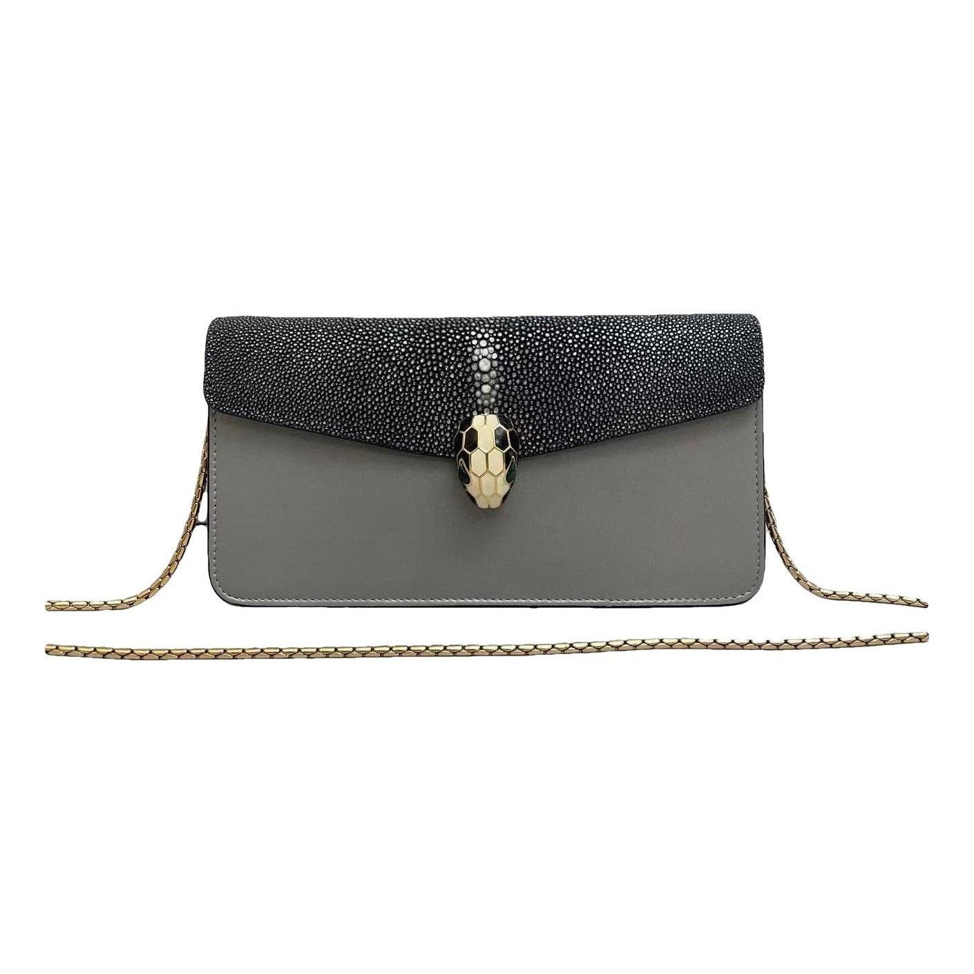 Serpenti leather handbag