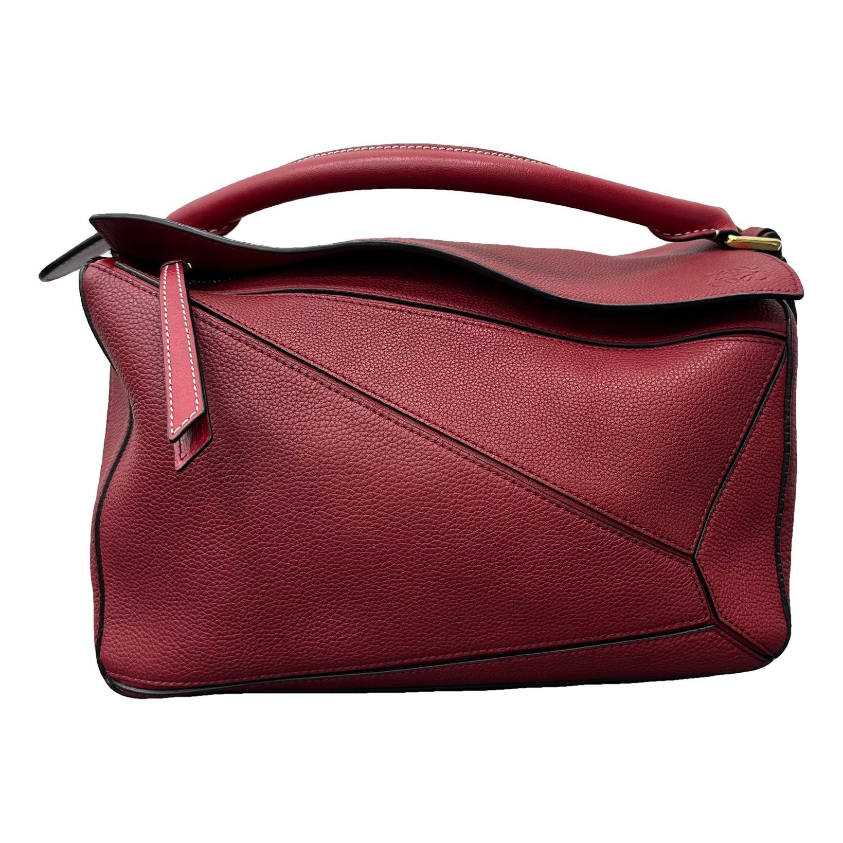 Puzzle leather handbag