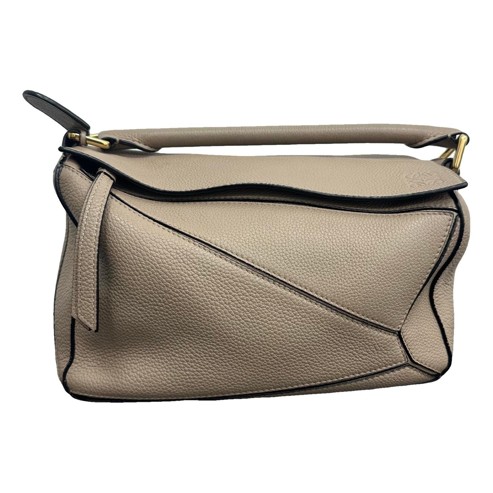 Puzzle leather handbag