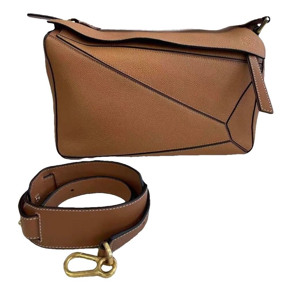 Puzzle leather handbag