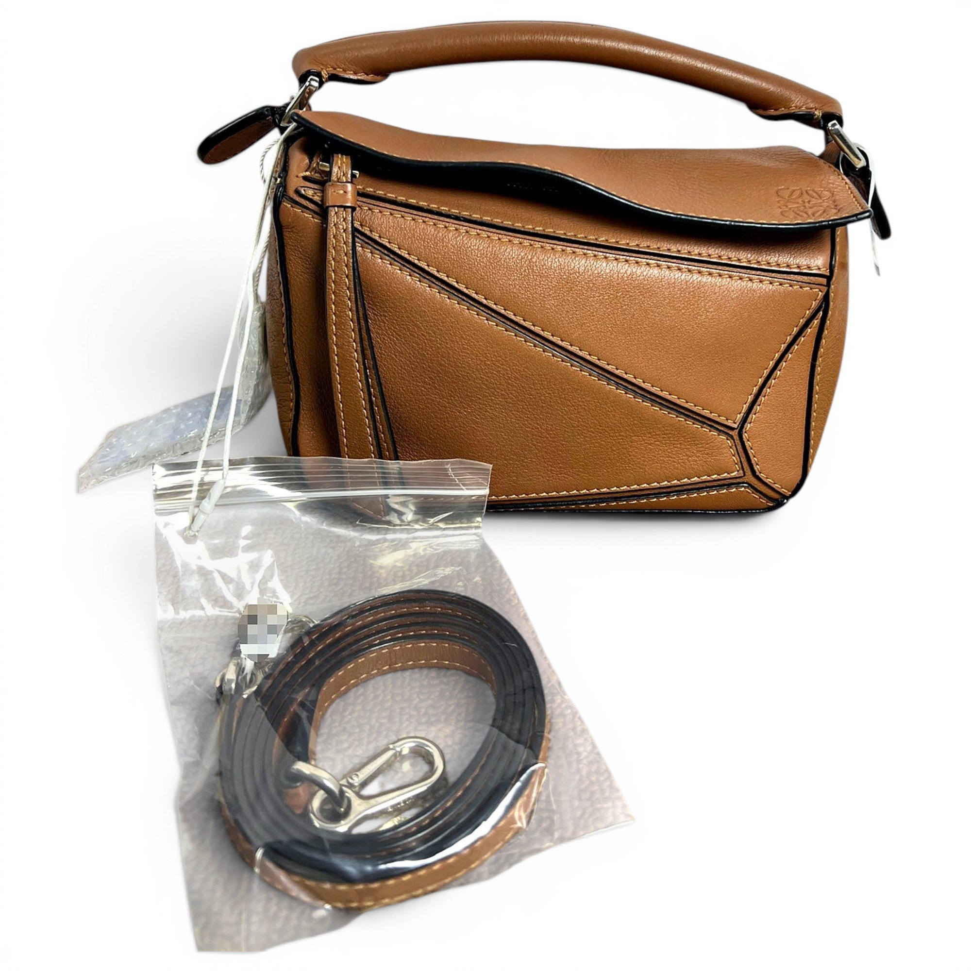 Puzzle leather handbag