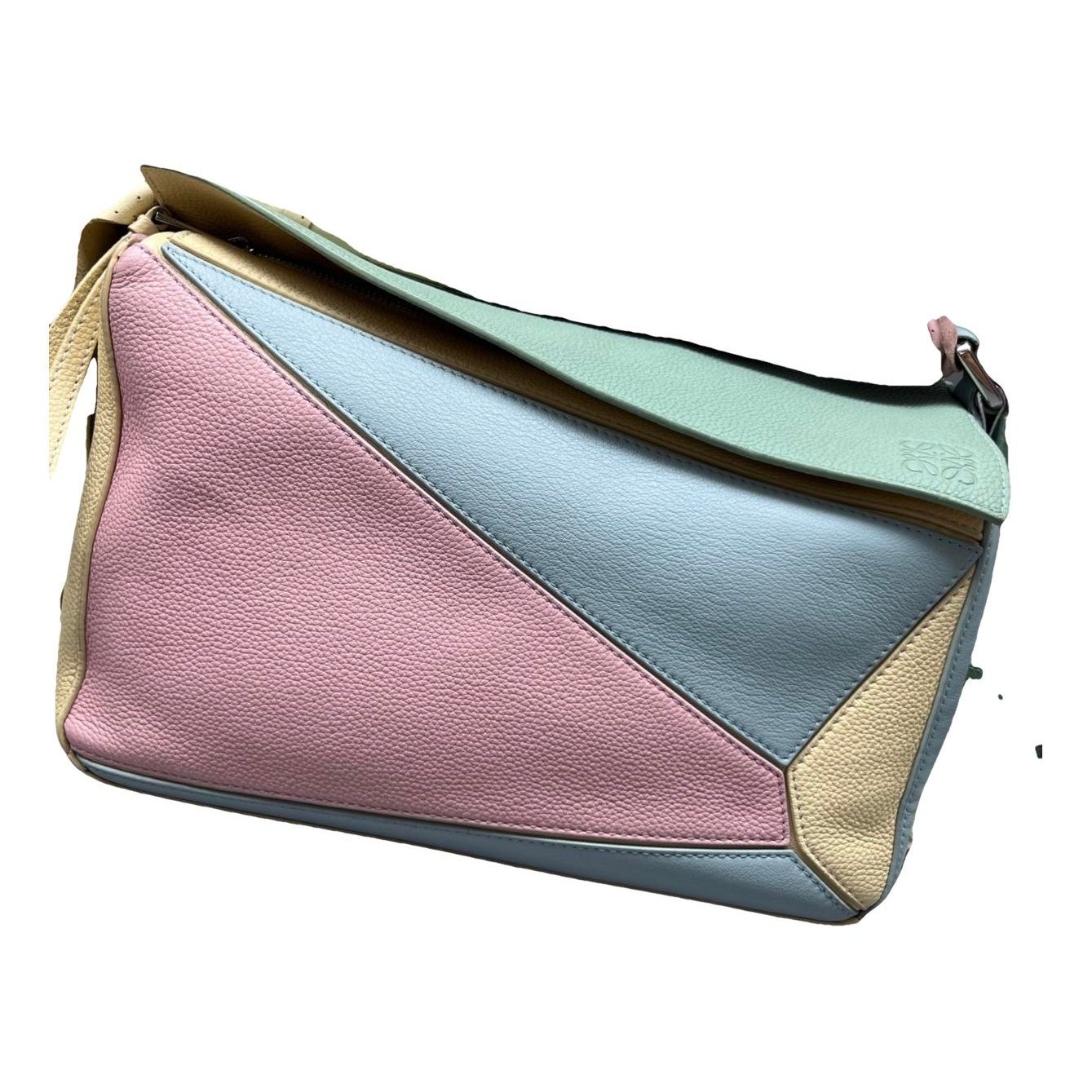 Puzzle leather handbag