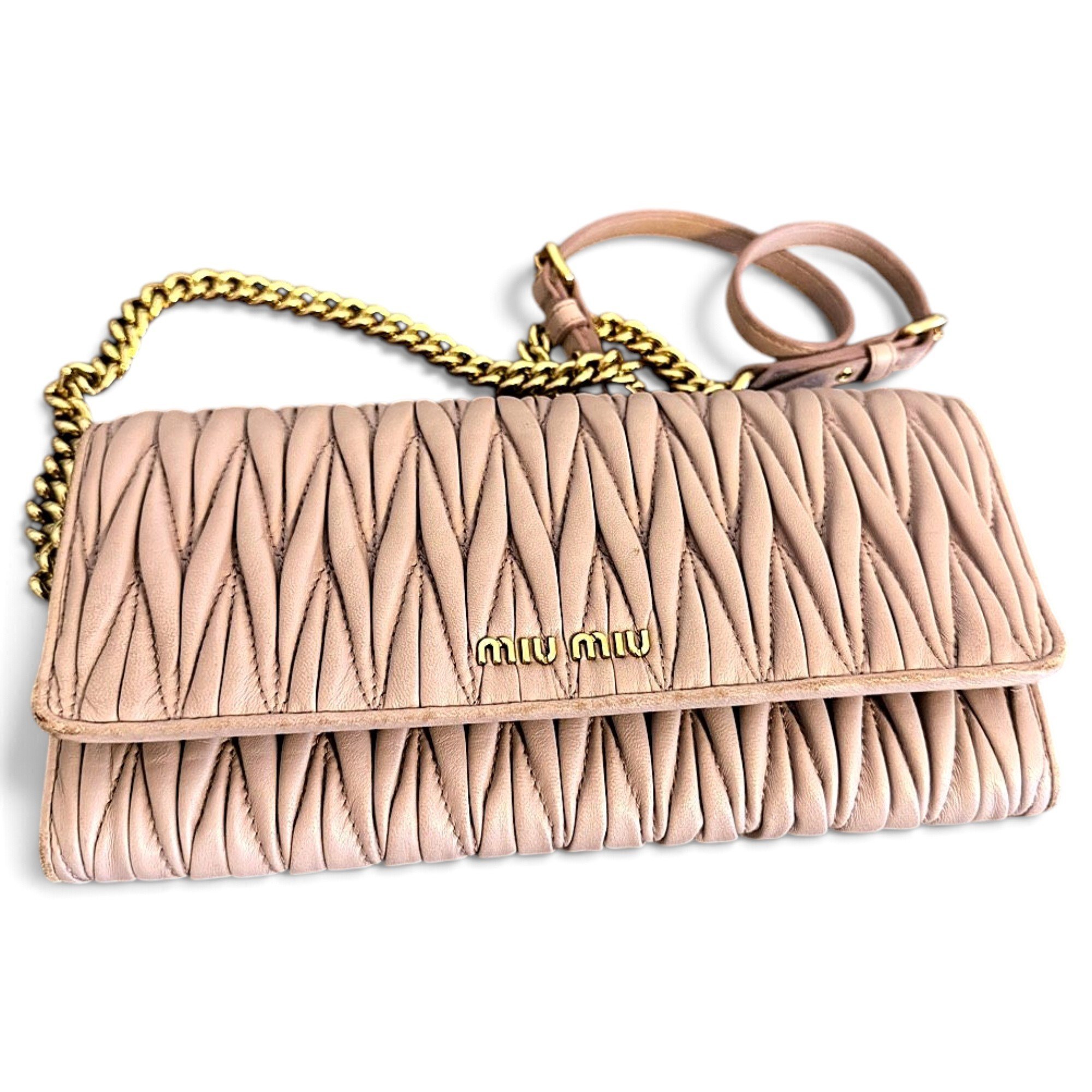 Matelassé leather clutch bag