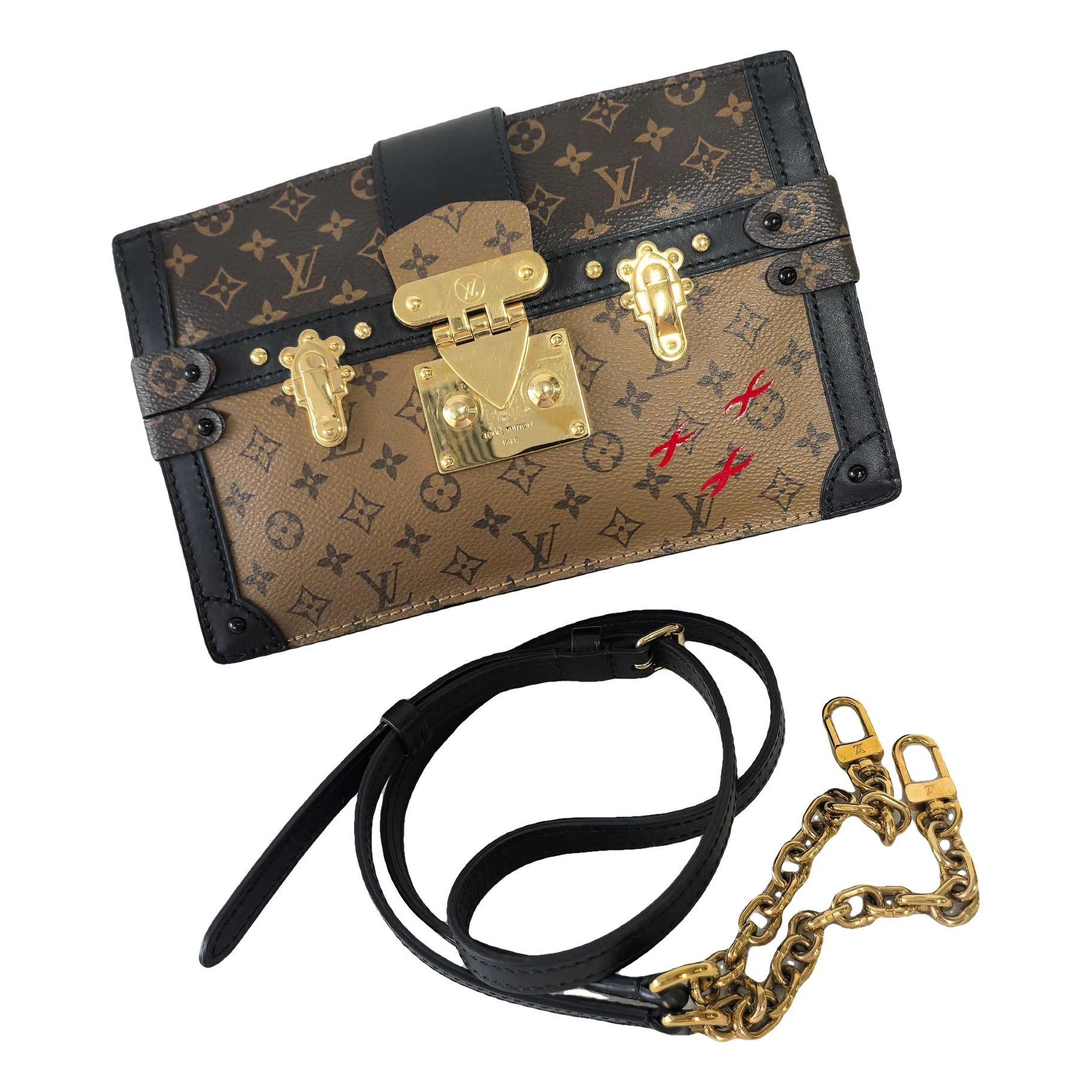 Pochette Trunk leather handbag