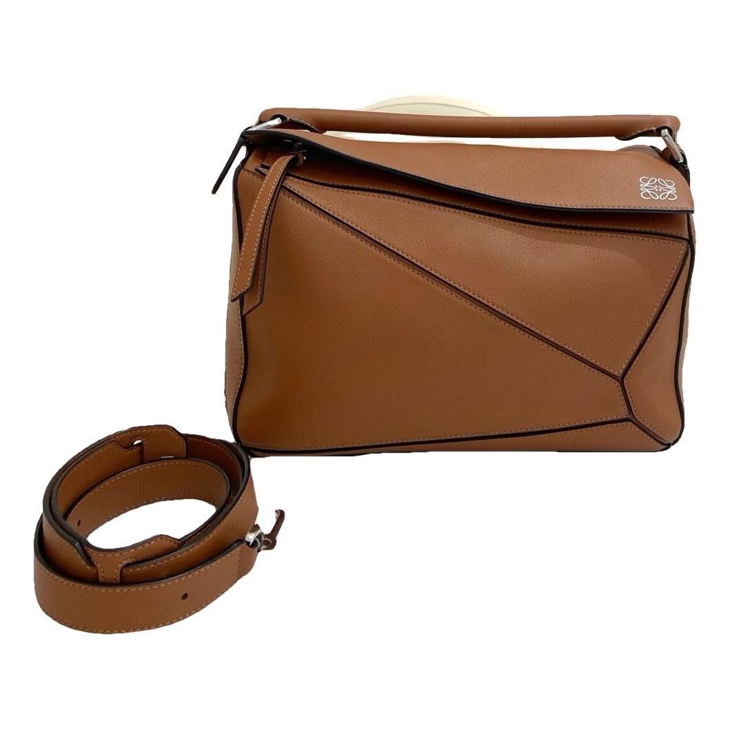 Puzzle leather handbag