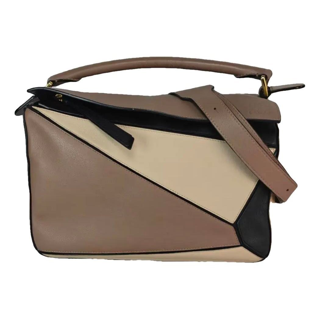 Puzzle leather crossbody bag
