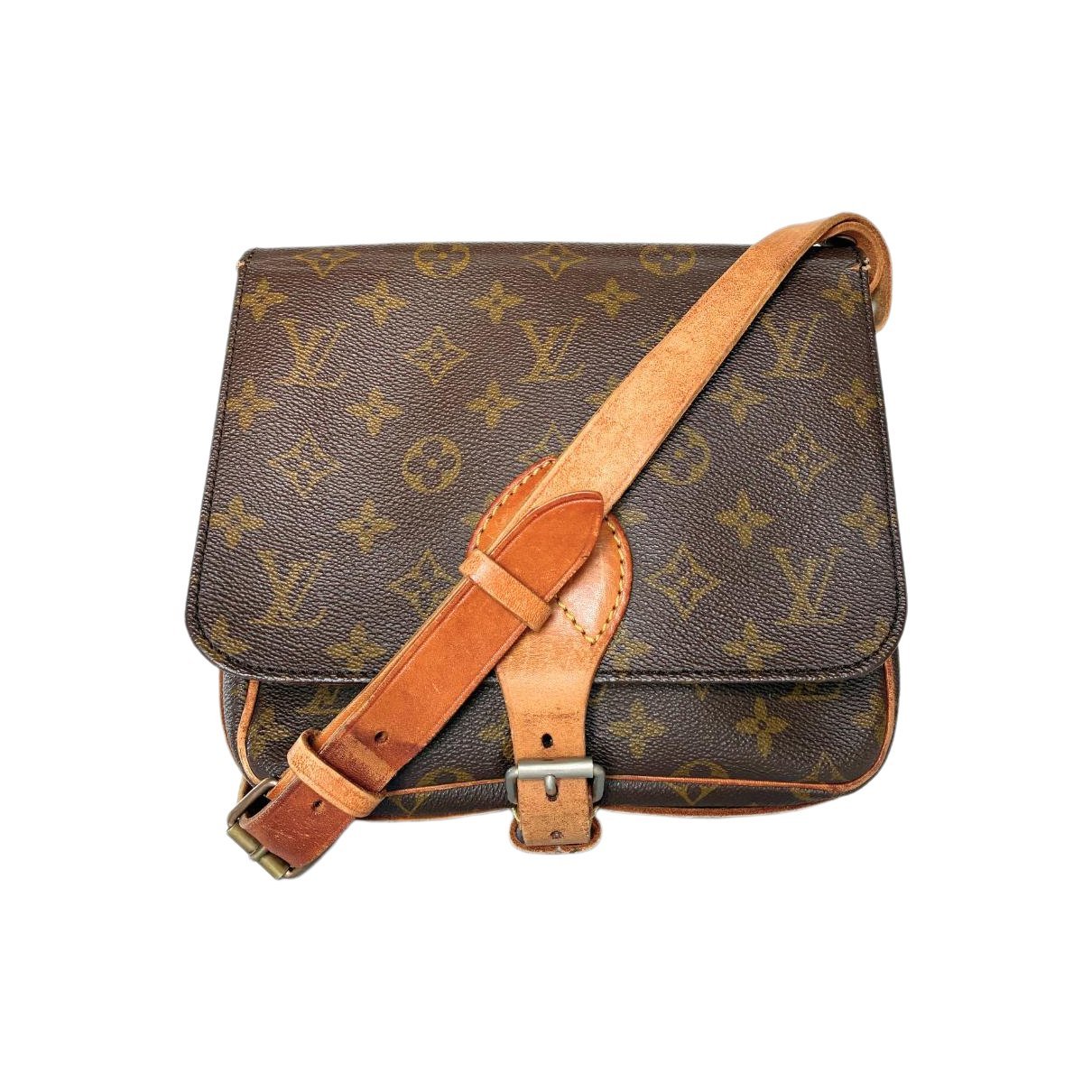 Cartouchière cloth handbag