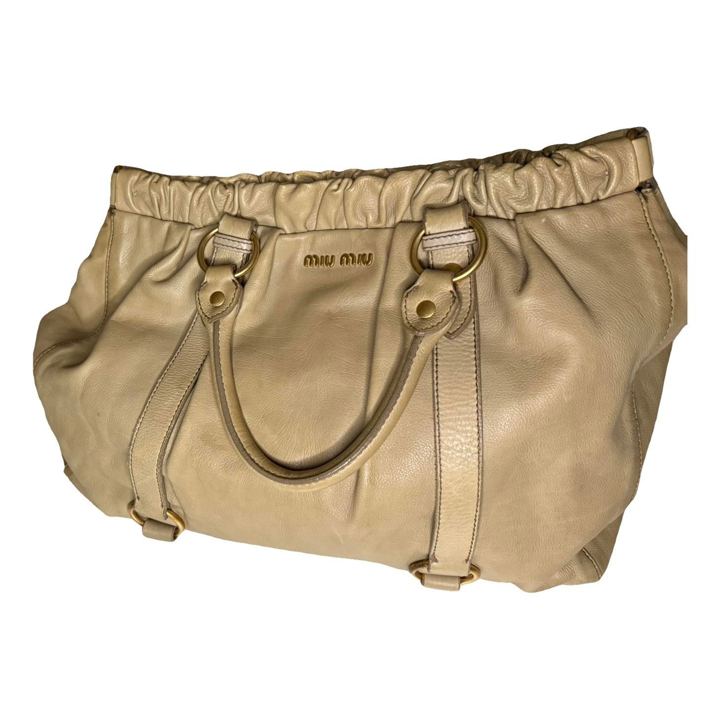 Bow bag leather handbag