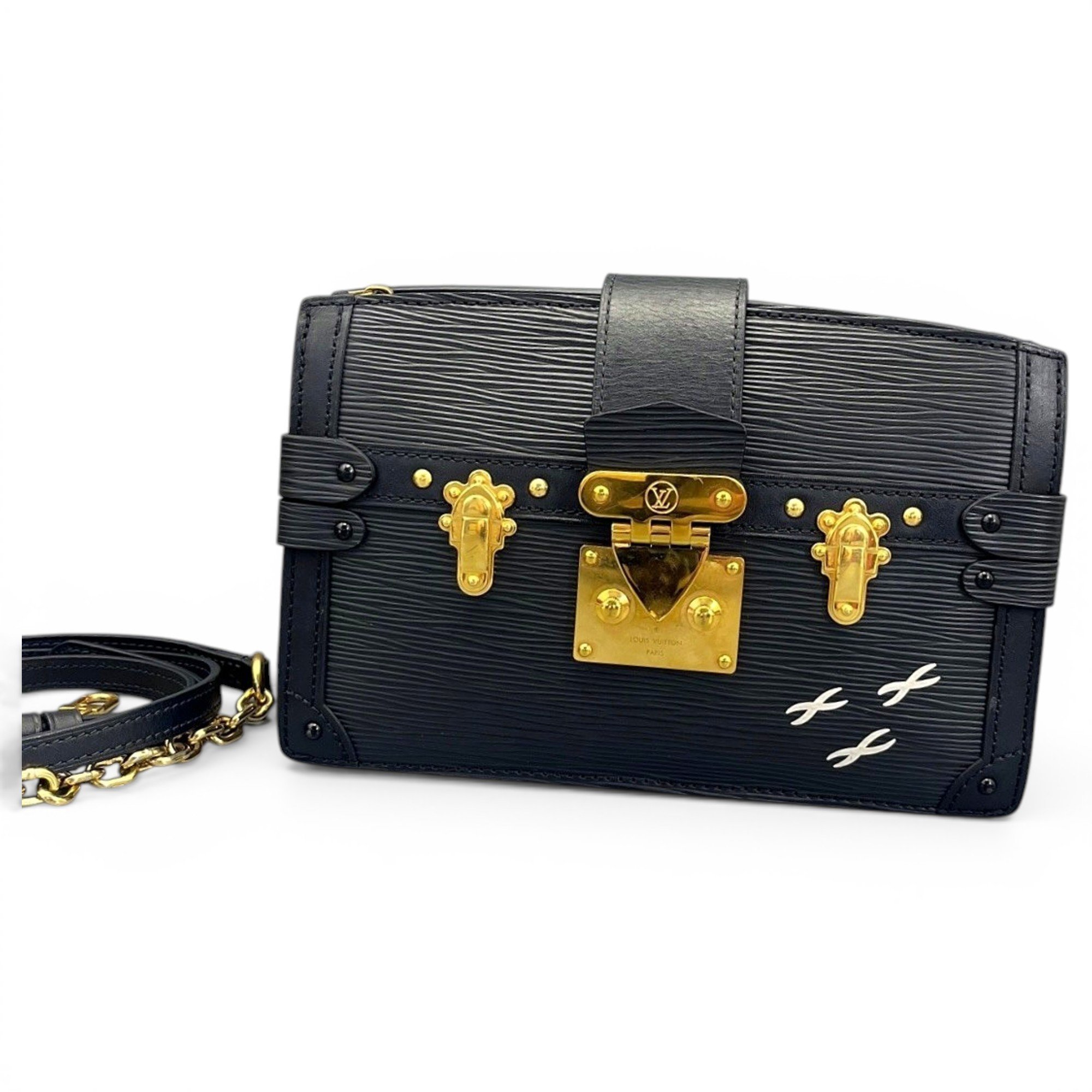 Pochette Trunk leather handbag