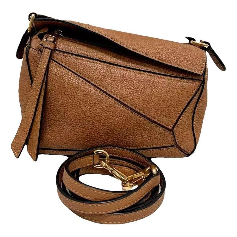 Puzzle leather handbag