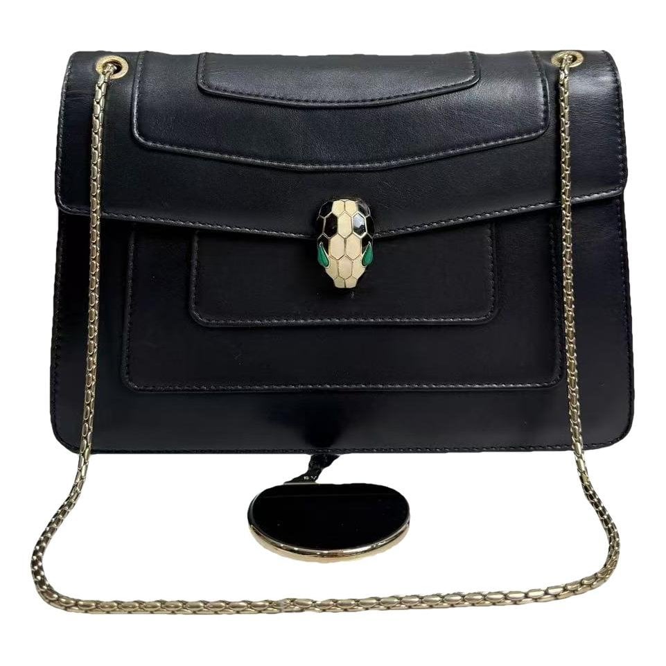 Serpenti leather handbag