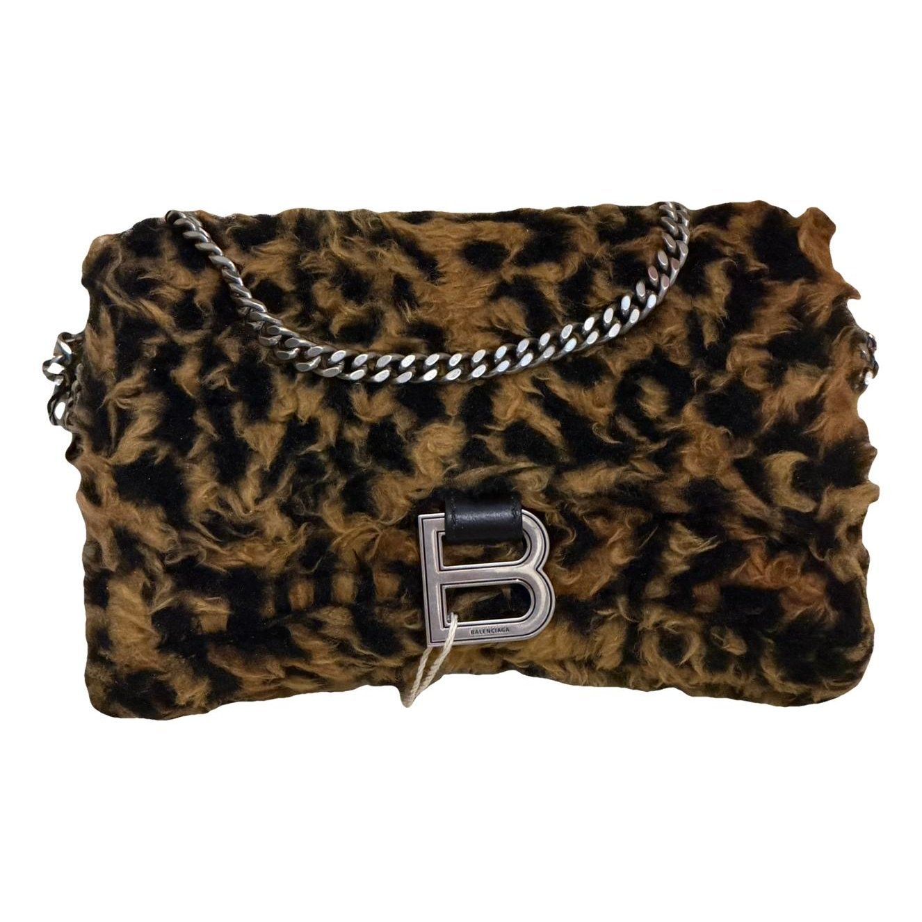 Hourglass leather handbag