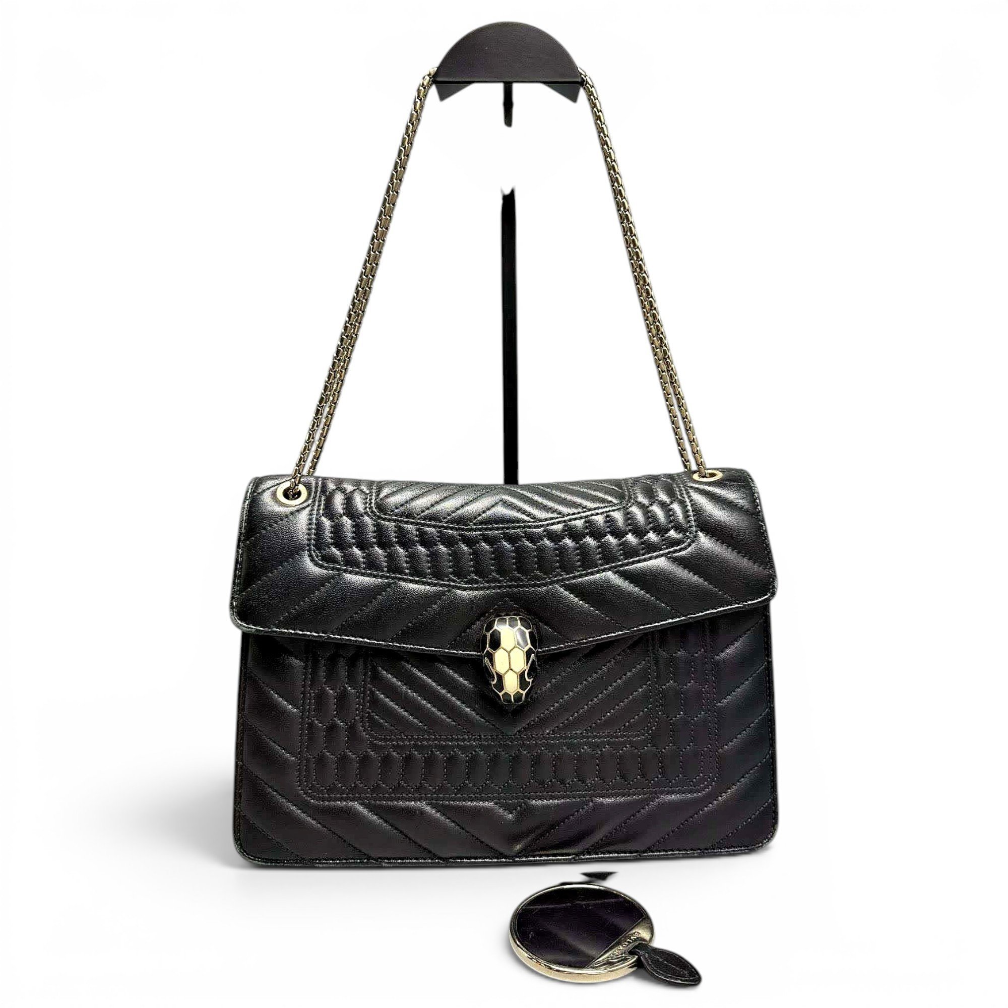Serpenti leather handbag
