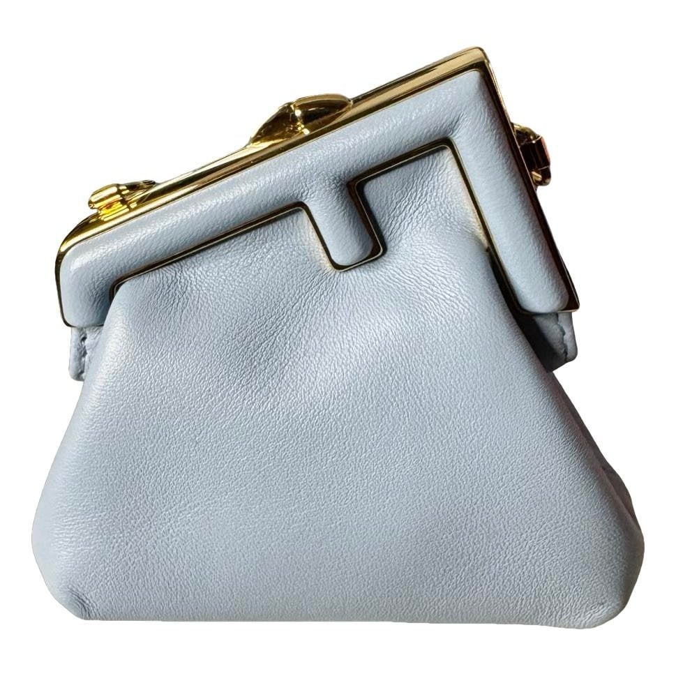 First leather mini bag