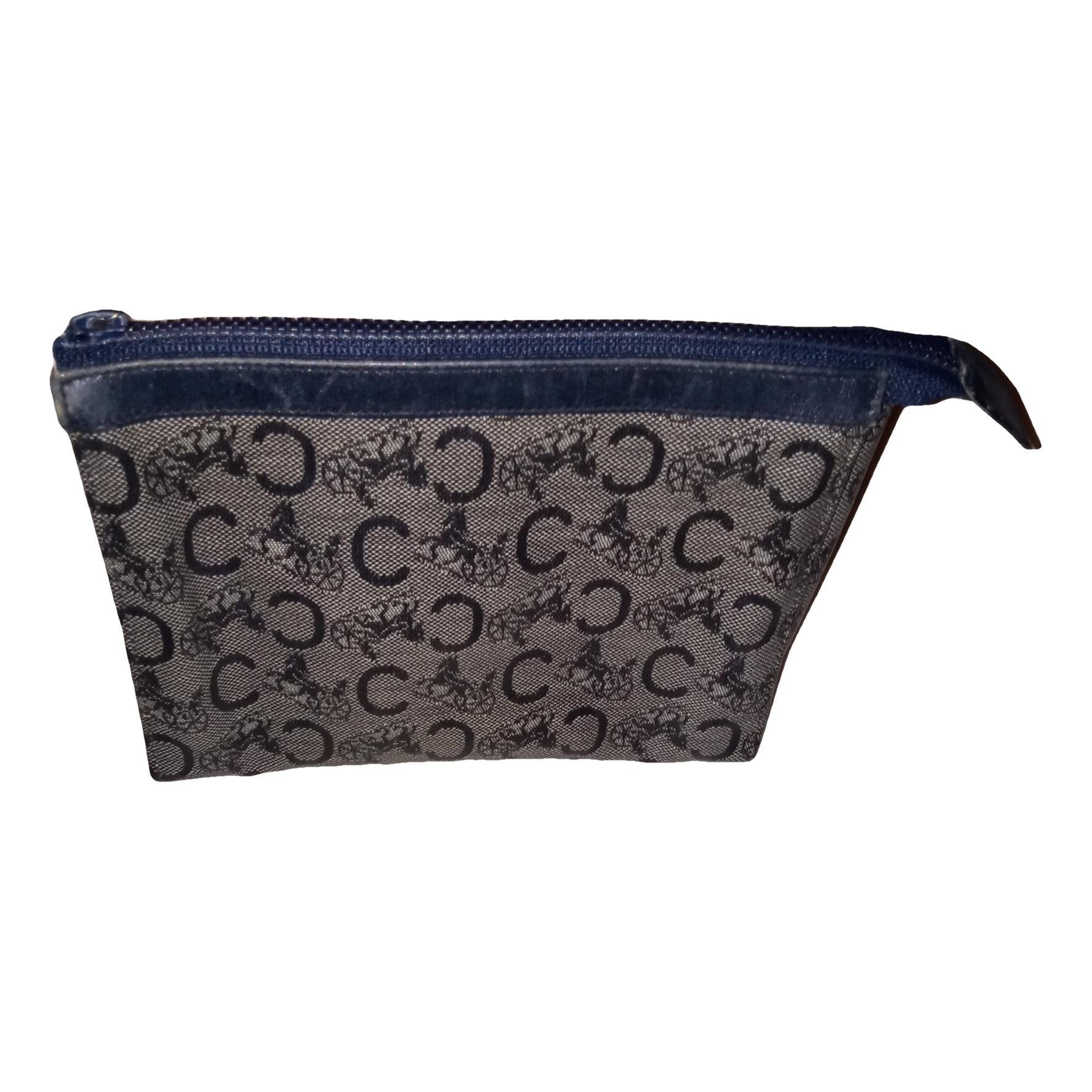 Triomphe Vintage leather clutch bag