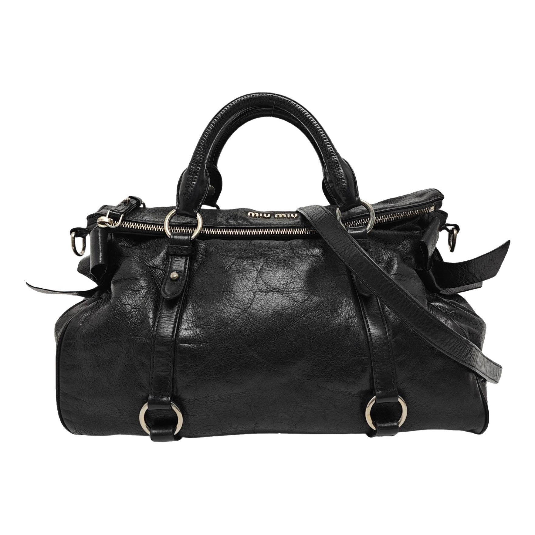Bow bag leather handbag