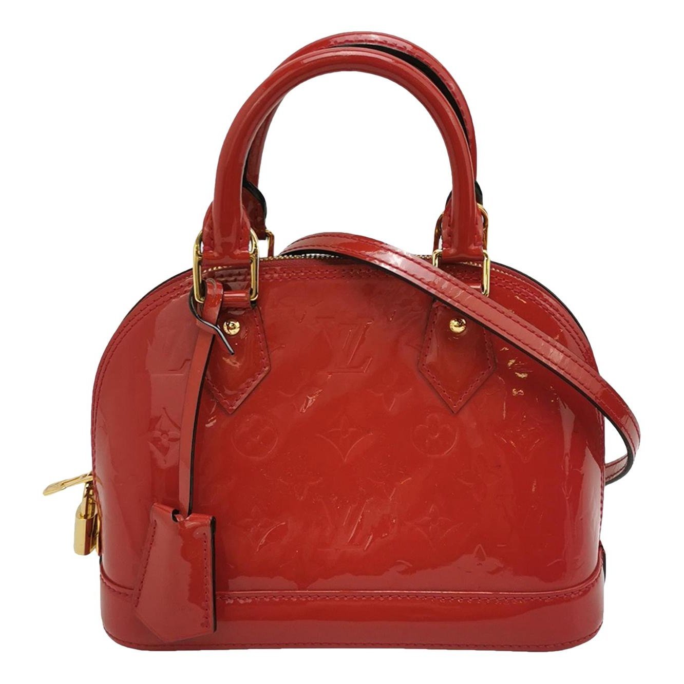 Alma BB patent leather handbag