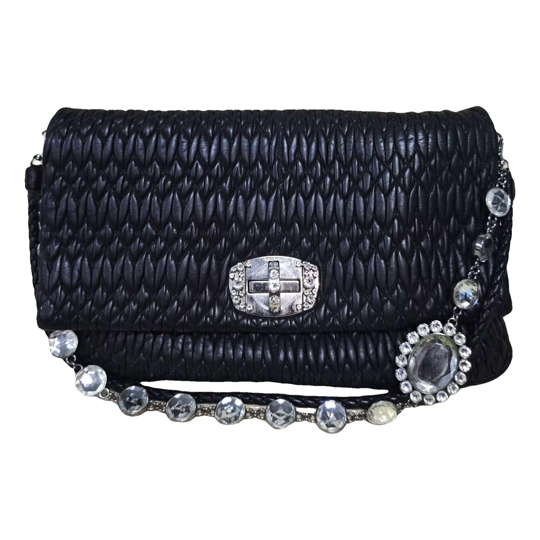 Miu Crystal leather handbag