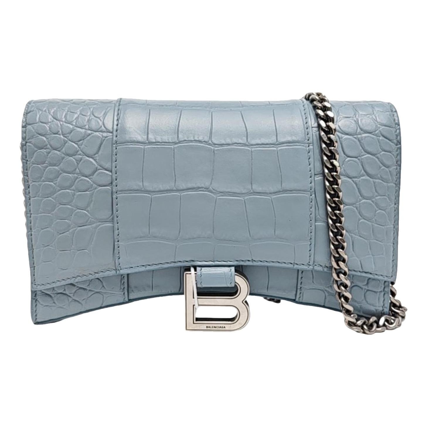 Hourglass leather handbag