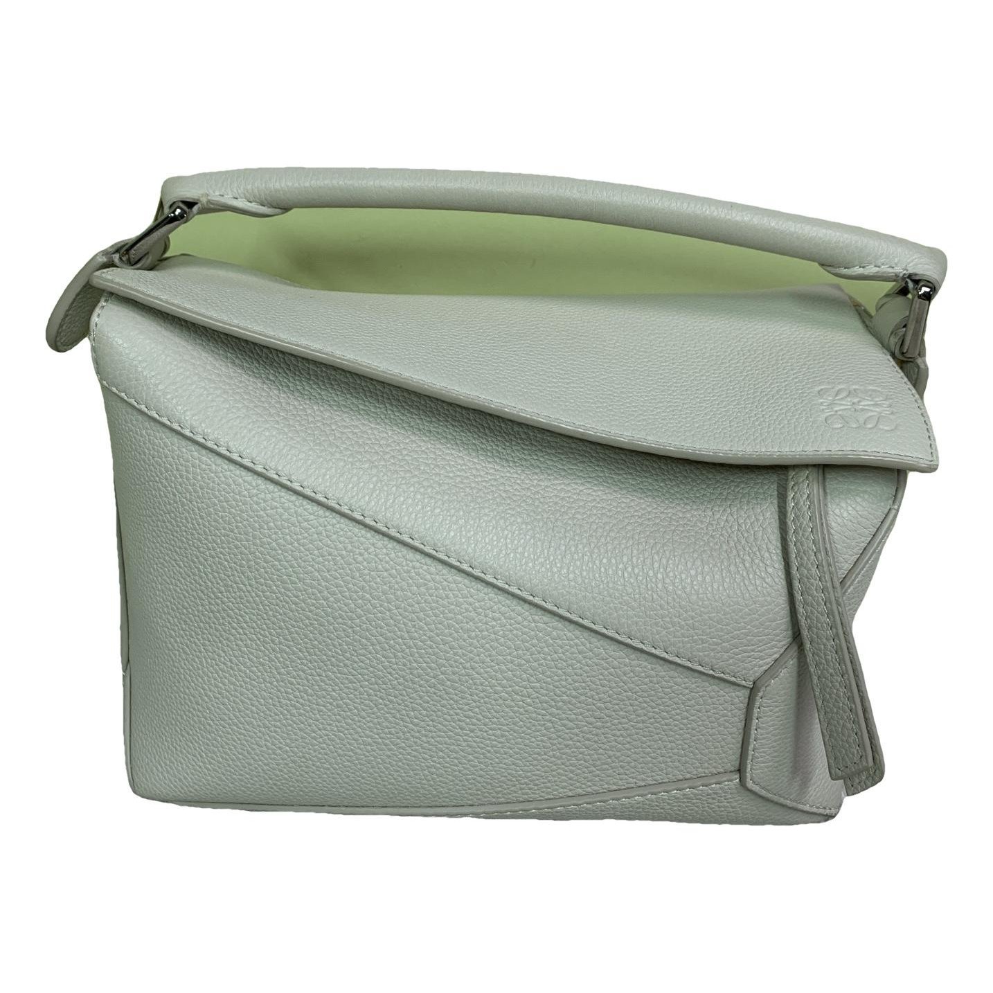 Puzzle leather handbag