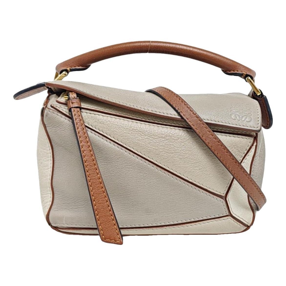 Puzzle leather handbag