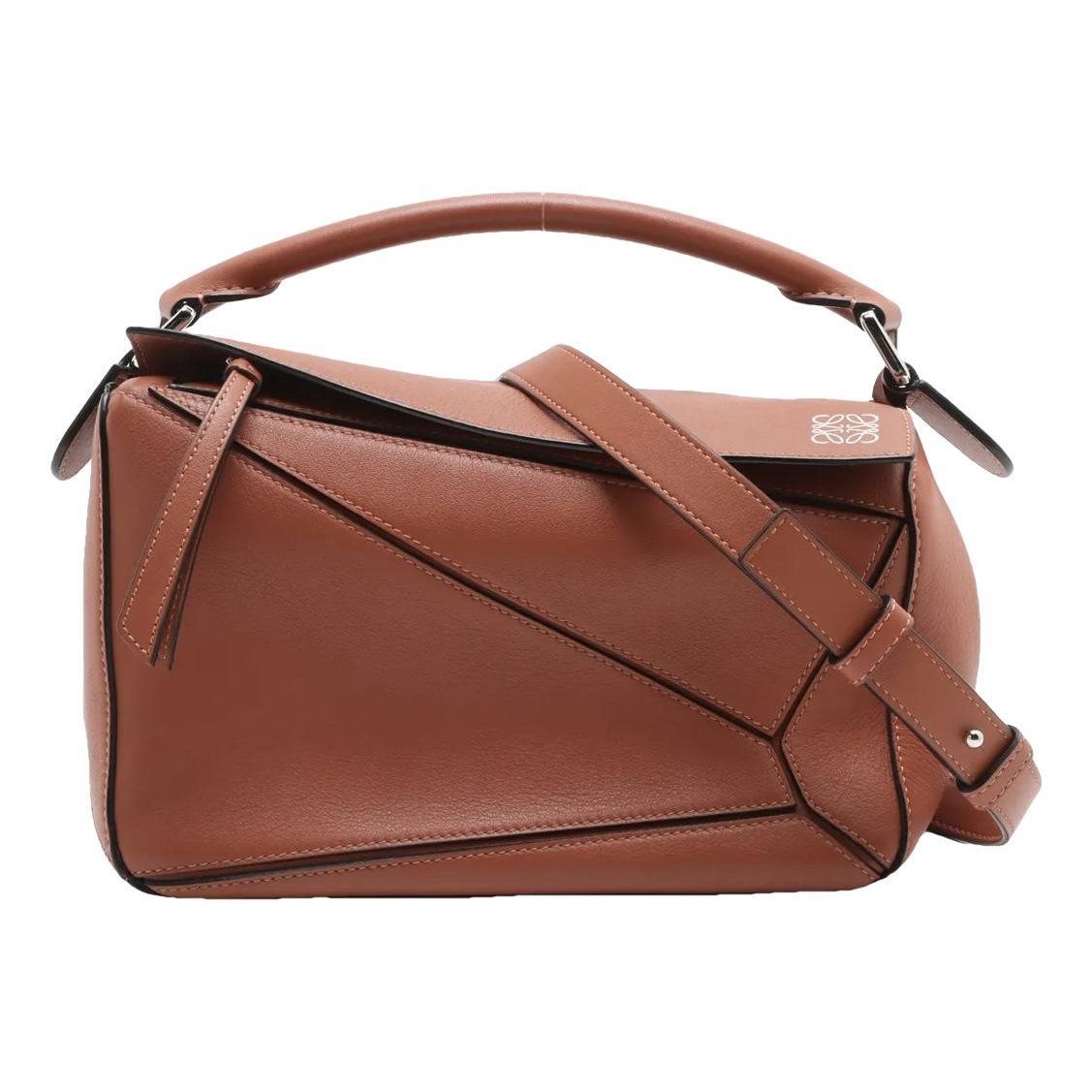 Puzzle leather handbag