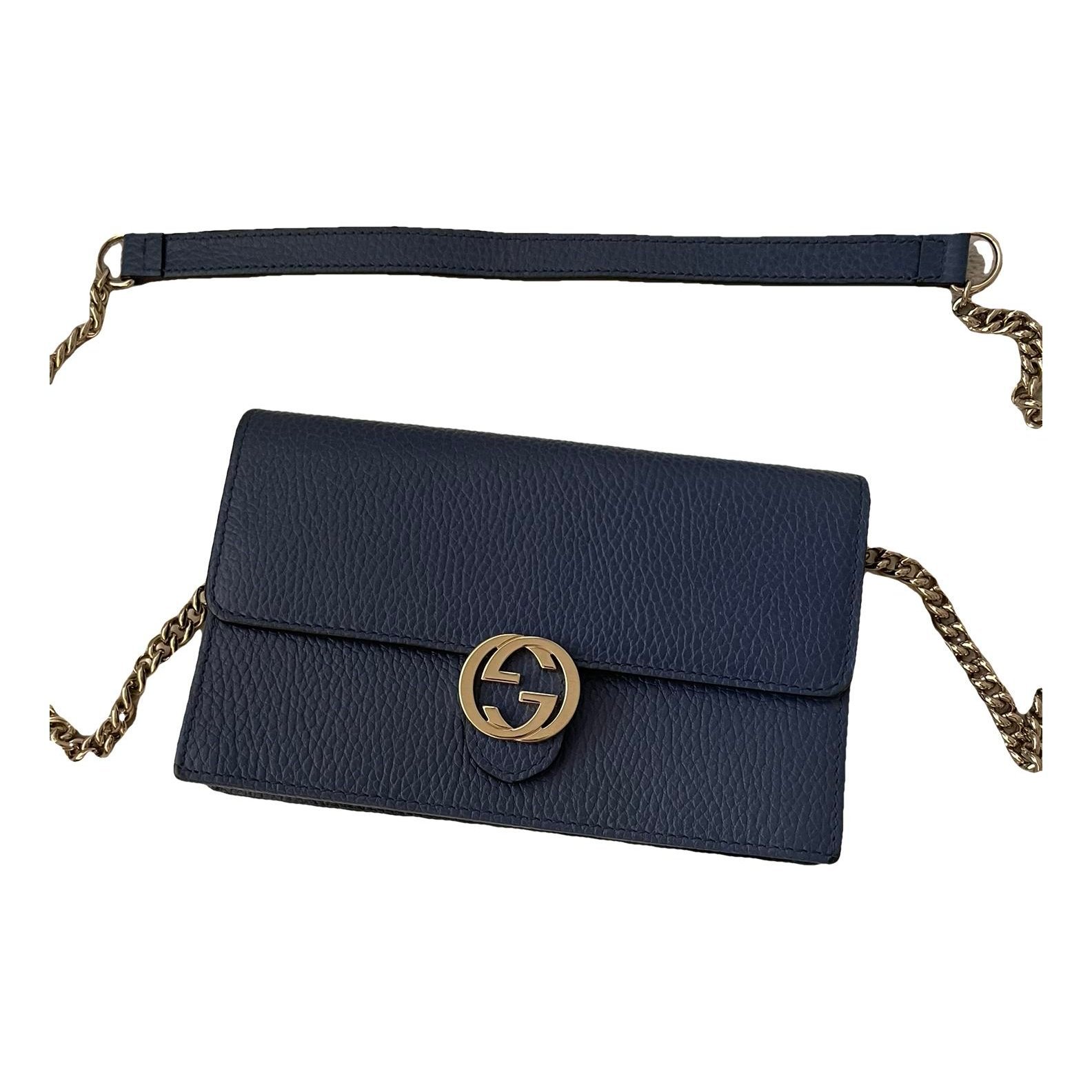Interlocking leather clutch bag