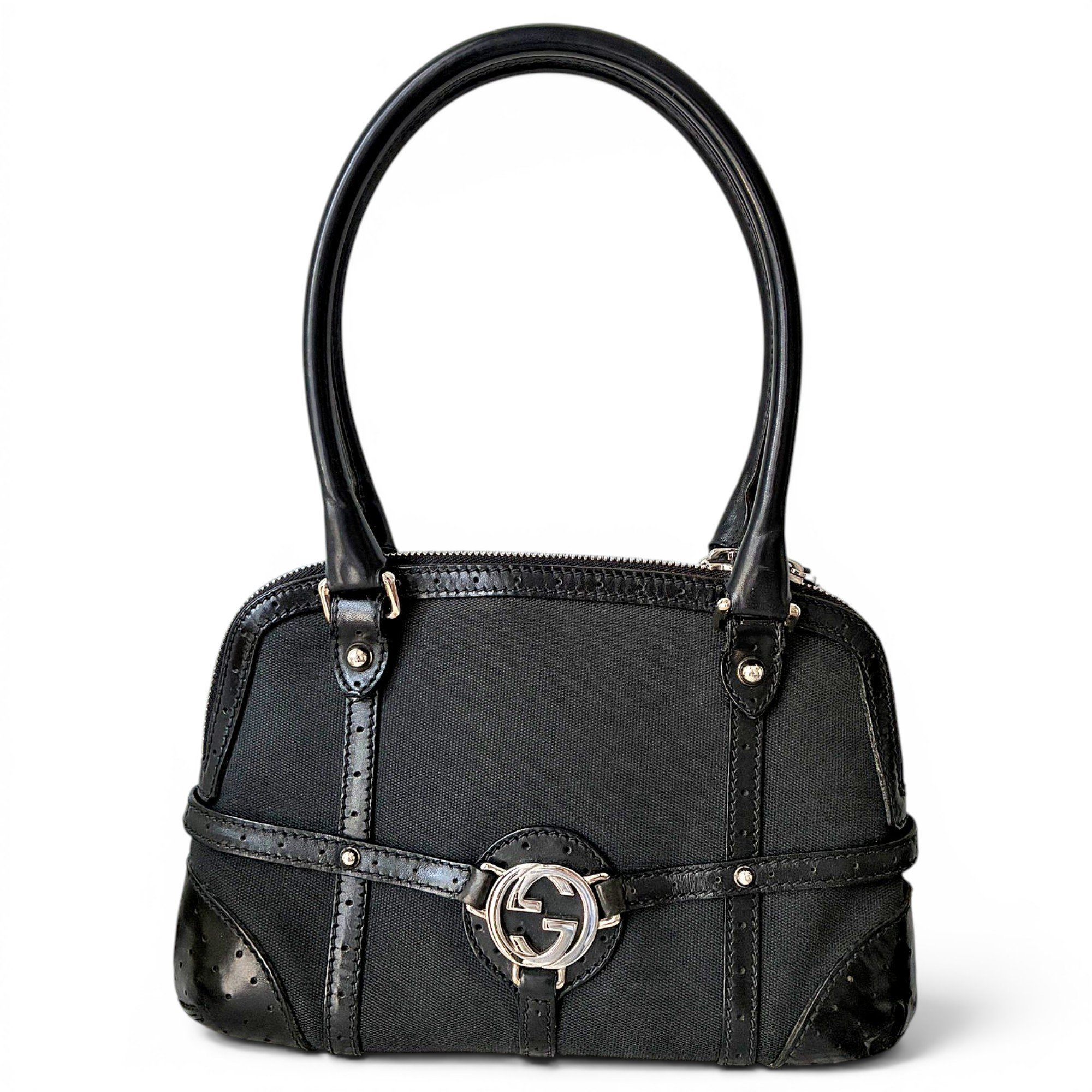 Interlocking leather clutch bag